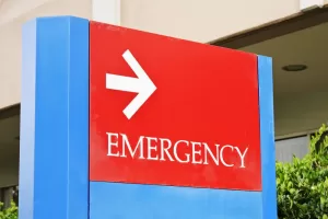Sign,At,The,Hospital,Points,Towards,The,Emergency,Room,Entrance. phimosis