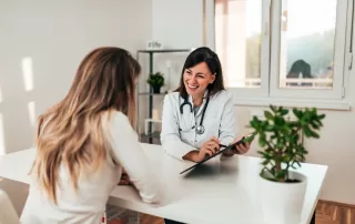 Female doctor explaining diagnosis to her patient