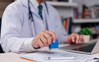 doctor issuing a medical certificate